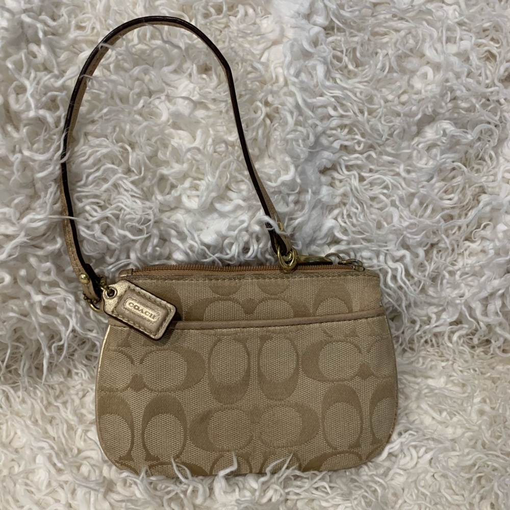COACH • Logo Tan and gold Top Zip Closure Wristlet